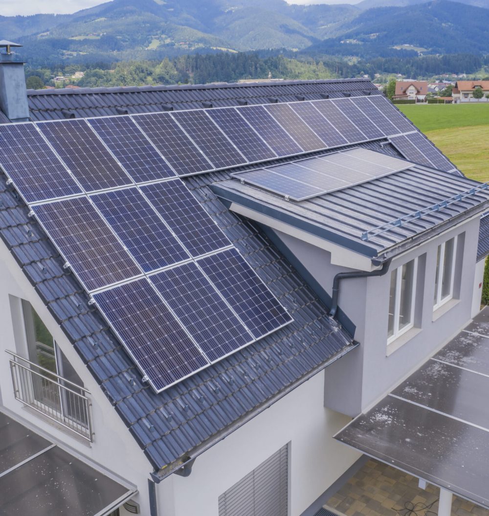 aerial-view-private-house-with-solar-panels-roof (1)